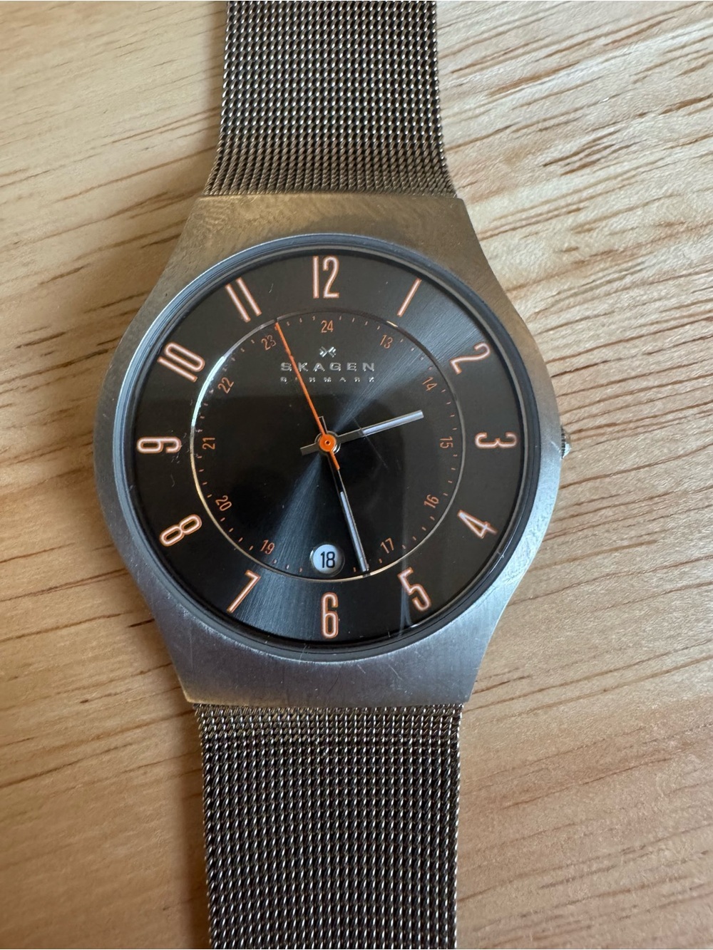Skagen Men’s Black Dial Mesh Watch with Orange Accents